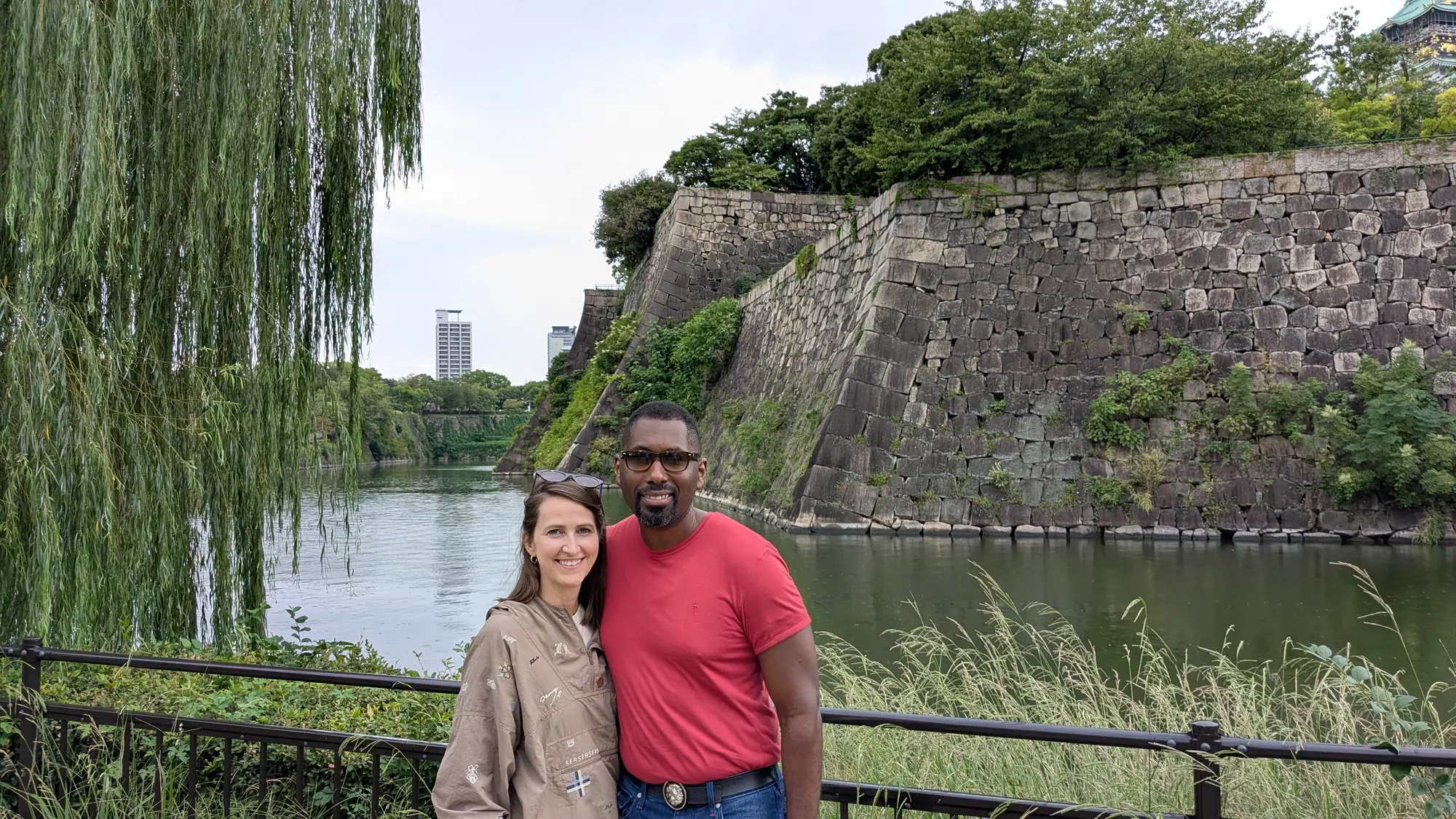 Guests beside the castle moat
