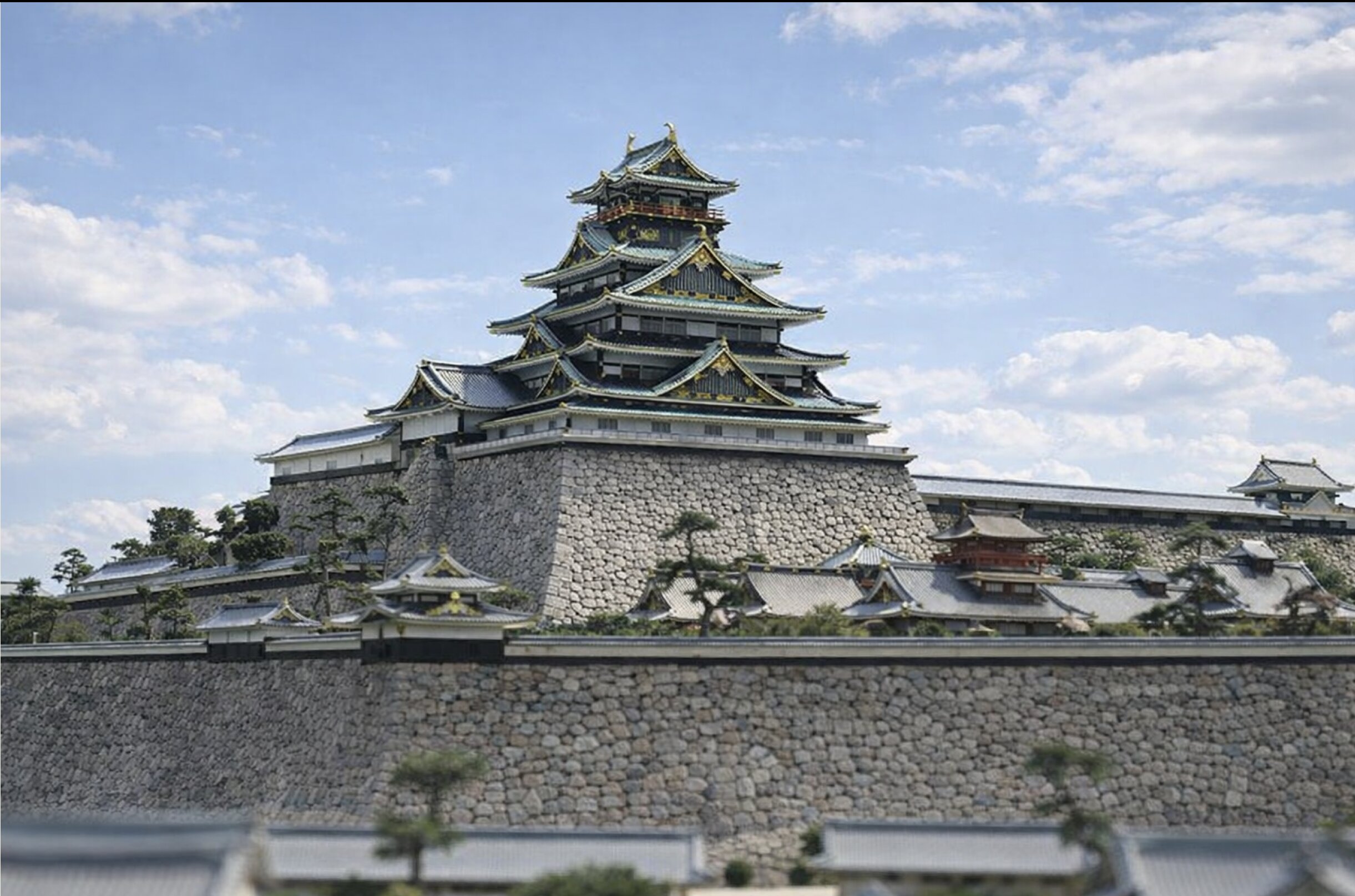 Osaka Castle rising above Nishinomaru Garden